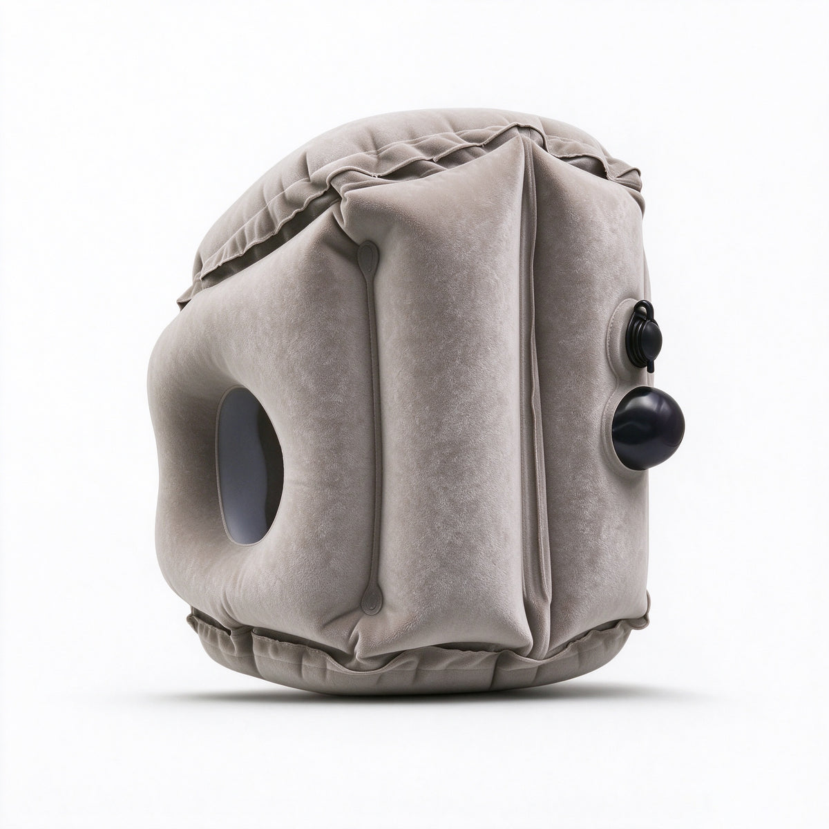 Side view of Lumkix inflatable travel pillow showing built-in manual press pump and air valve